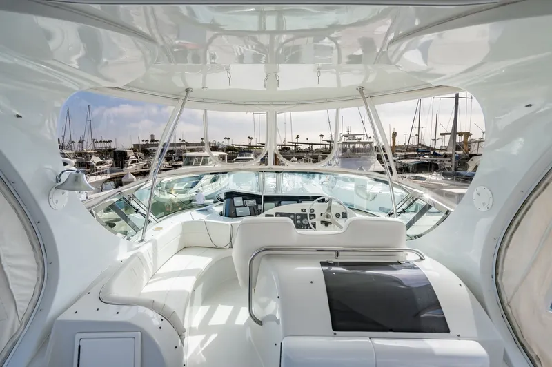 Slide: The Image of Luxurious 2003 Bluewater Yachts Custom 6000 interior with marina view. - 73
