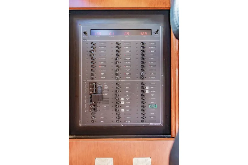 Slide: The Image of Electrical control panel on 2003 Bluewater Yachts Custom 6000 boat. - 37