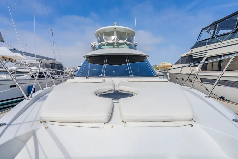 Slide: The Image of 2003 Bluewater Yachts Custom 6000, luxury yacht docked with spacious deck and sleek design. - 20