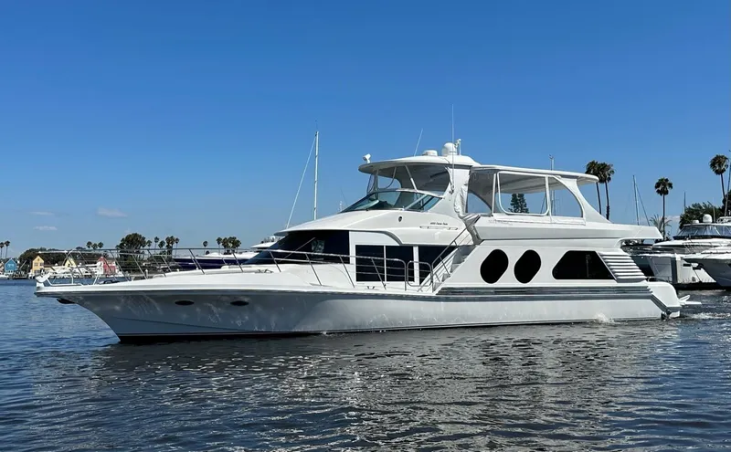 The Image of A luxurious 2003 Bluewater Yachts Custom 6000 on calm waters. - 0