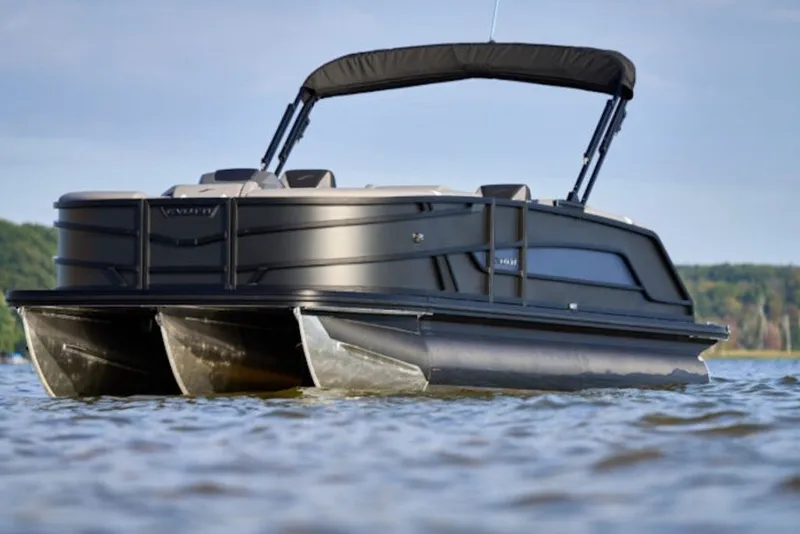 The Image of 2027 Evotti 521QL pontoon boat on a serene lake, showcasing sleek design and modern features. - 1
