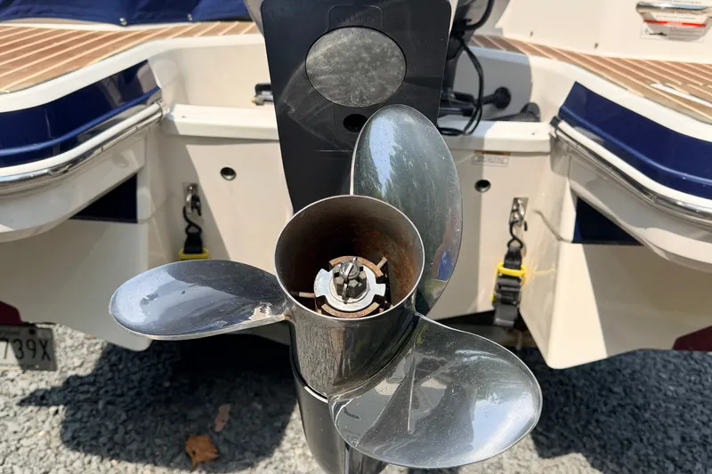 Slide: The Image of Close-up of a 2016 Chaparral 250 Suncoast boat propeller and stern details. - 7