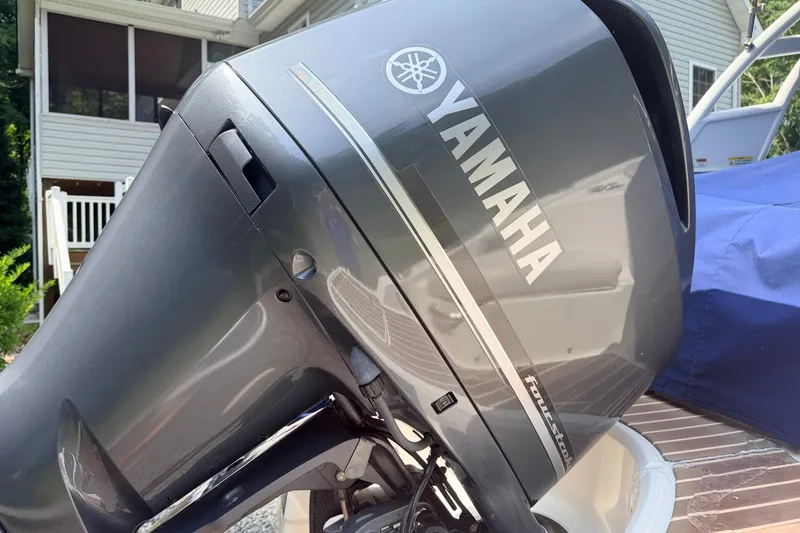 Slide: The Image of Yamaha outboard motor on 2016 Chaparral 250 Suncoast boat, close-up view. - 6
