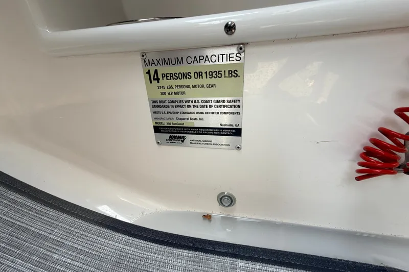 Slide: The Image of Capacity plate on 2016 Chaparral 250 Suncoast, max 14 persons or 1935 lbs. - 38