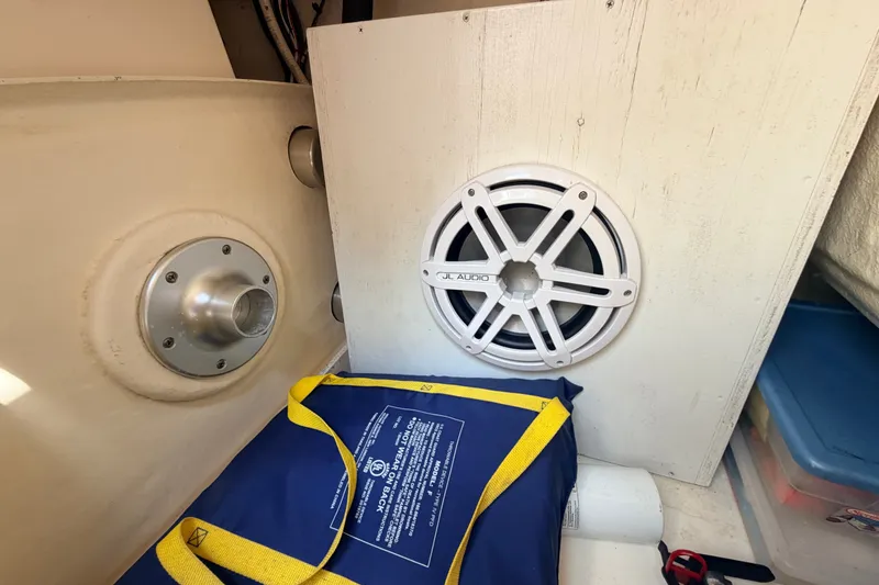 Slide: The Image of Interior of 2016 Chaparral 250 Suncoast with JL Audio speaker and safety equipment. - 33
