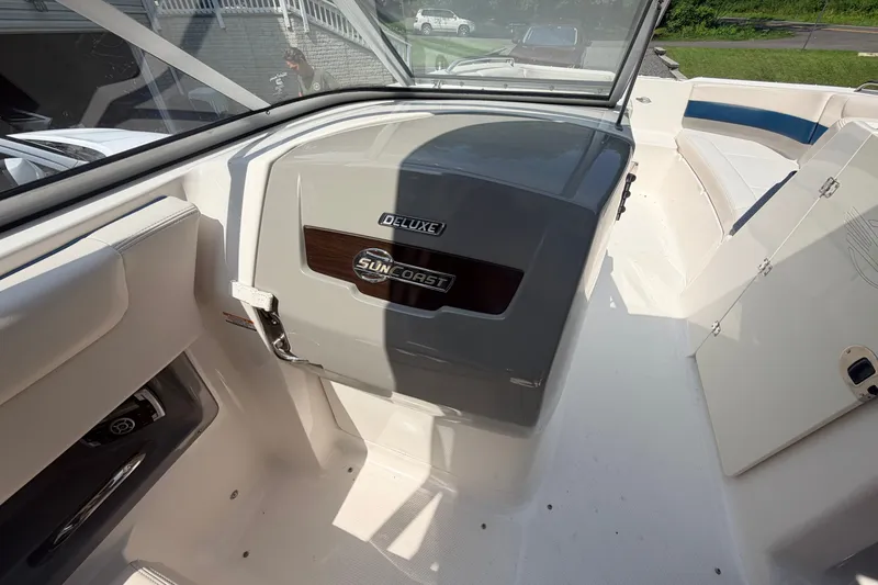 Slide: The Image of 2016 Chaparral 250 Suncoast boat interior with deluxe Suncoast branding. - 27