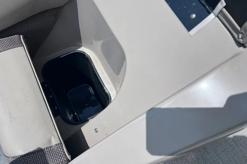 Slide: The Image of Storage compartment in a 2020 Regency 250 DL3 boat, featuring a sleek interior design. - 24