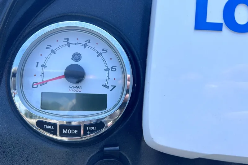 Slide: The Image of Close-up of a 2020 Regency 250 DL3 RPM gauge, showing tachometer and control buttons. - 19
