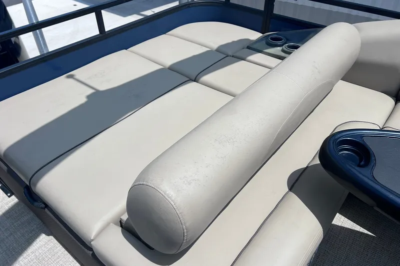 Slide: The Image of Luxurious seating on 2020 Regency 250 DL3 pontoon boat with cup holders. - 15