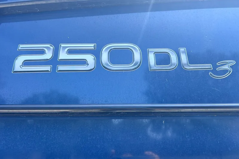 Slide: The Image of 2020 Regency 250 DL3 logo on blue surface, showcasing model details. - 32