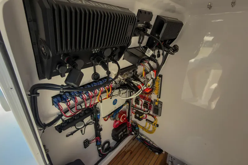 Slide: The Image of Electrical wiring and components inside a Weaver 25 model, year 2025. - 10