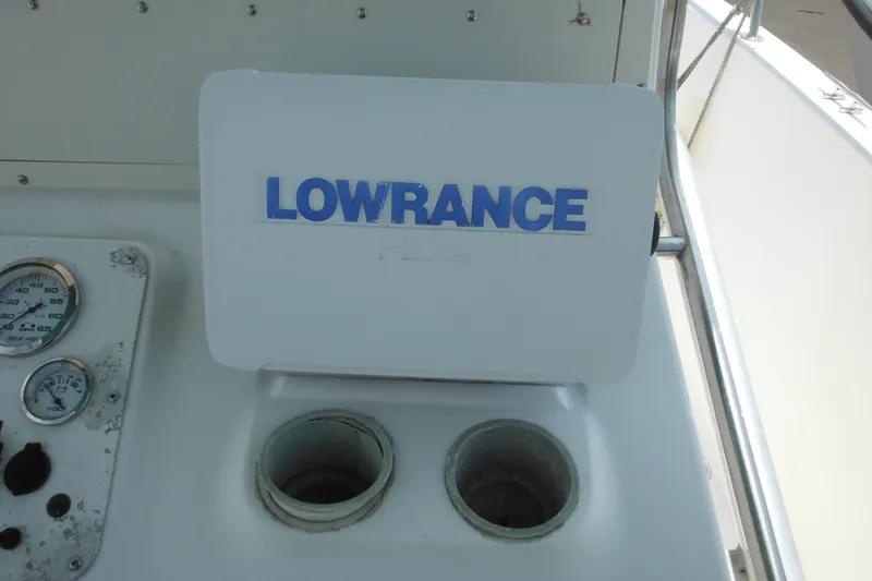 Slide: The Image of Console of a 2001 Sea Pro 235 Center Console with Lowrance device. - 13