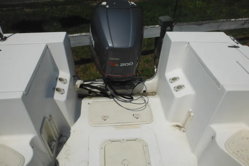 Slide: The Image of 2001 Sea Pro 235 Center Console boat with Yamaha V6 200 outboard motor. - 11