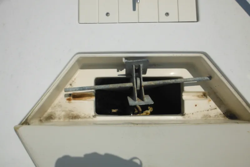 Slide: The Image of Anchor storage compartment on a 2001 Sea Pro 235 Center Console boat. - 25