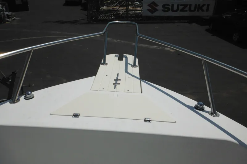 Slide: The Image of Bow view of 2001 Sea Pro 235 Center Console boat with stainless steel railings. - 17