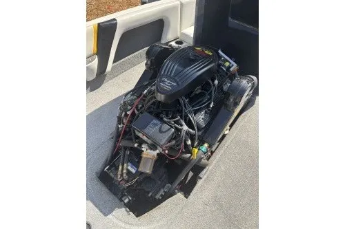 Slide: The Image of 2001 Infinity ZX-1 engine in a boat compartment, showcasing intricate wiring and components. - 16