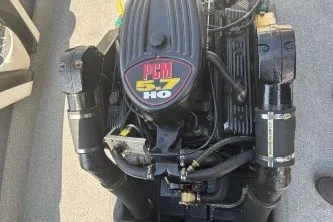 Slide: The Image of Engine of a 2001 Infinity ZX-1 with PCM 57 HO branding. - 18