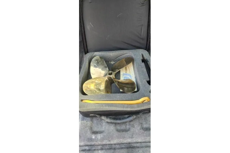Slide: The Image of Old boat propeller in foam case, Infinity ZX-1, 2001 model. - 19