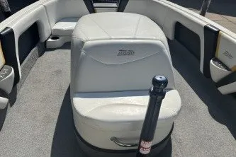 Slide: The Image of Interior of a 2001 Infinity ZX-1 boat with white seating and carpeted flooring. - 13