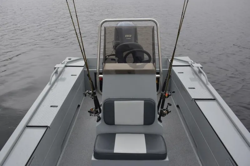 Slide: The Image of Manufacturer Provided Image: 2025 Smoker Craft Pro Sportsman 1872 CC boat on calm water. - 4