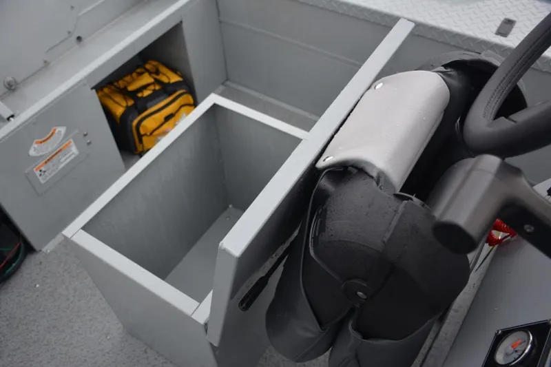 Slide: The Image of Manufacturer Provided Image: Interior of 2025 Smoker Craft Pro Sportsman 1872 CC with storage compartment. - 9