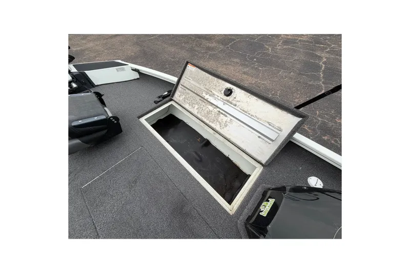 Slide: The Image of Open storage compartment on 2022 Crestliner XF 189 boat deck. - 17