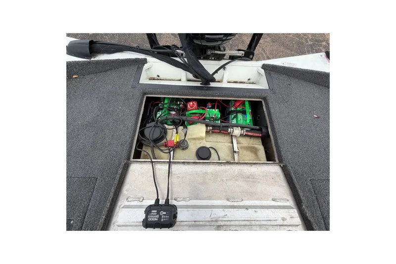 Slide: The Image of 2022 Crestliner XF 189 boat interior showing battery compartment and wiring. - 35