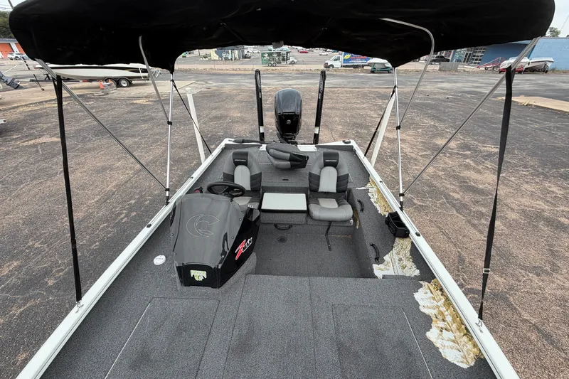 Slide: The Image of 2022 Crestliner XF 189 boat with canopy, seats, and steering console on display. - 20