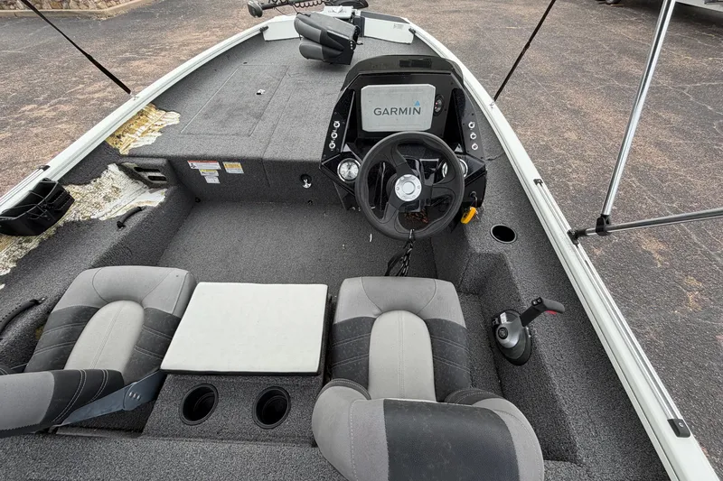 Slide: The Image of 2022 Crestliner XF 189 boat interior with Garmin system and dual seating. - 26