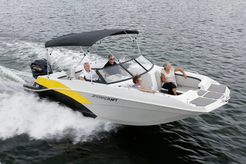 Slide: The Image of Manufacturer Provided Image: Starcraft SVX 230 DC OB 2026 on water with passengers. - 1