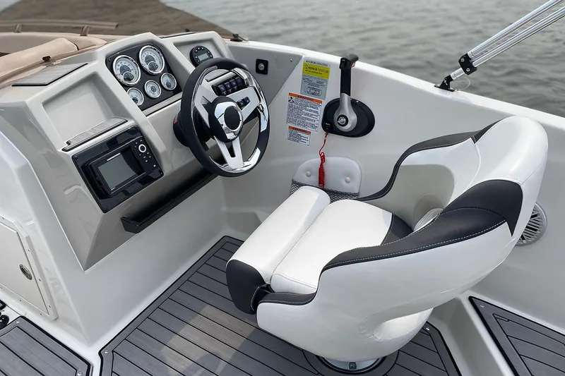 Slide: The Image of Manufacturer Provided Image: 2026 Starcraft SVX 230 DC OB helm with modern controls. - 5