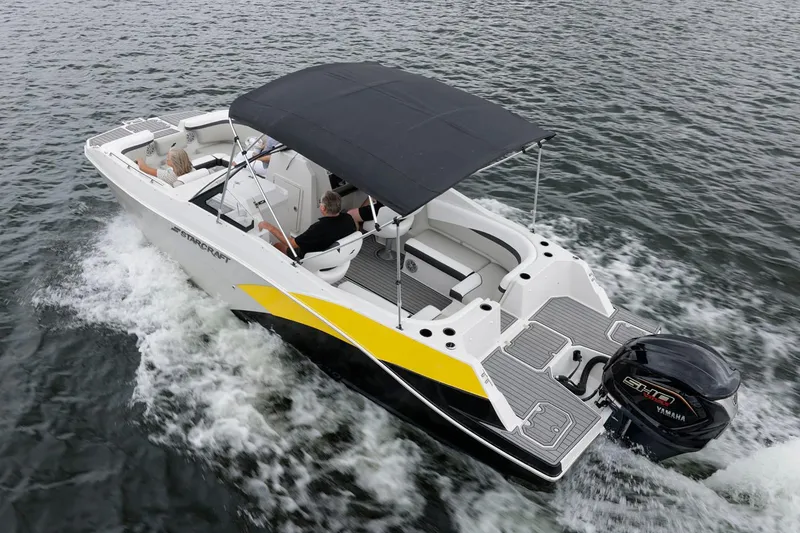 Slide: The Image of Manufacturer Provided Image: 2026 Starcraft SVX 230 DC OB boat on water, side view. - 2