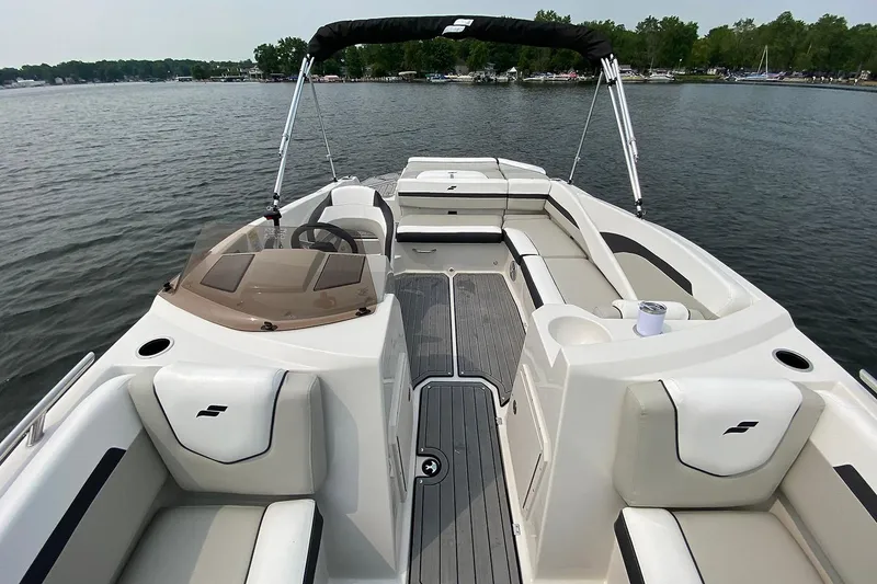 Slide: The Image of Manufacturer Provided Image: Starcraft SVX 230 DC OB 2026 on a serene lake. - 4