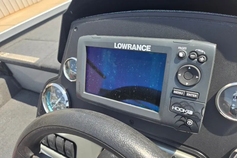 Slide: The Image of Dashboard of a 2018 Ranger RT188 boat featuring a Lowrance Hook2 fish finder. - 20