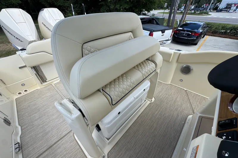Slide: The Image of 2027 Chris-Craft Catalina 28 boat interior with luxurious seating and twin Mercury engines. - 33