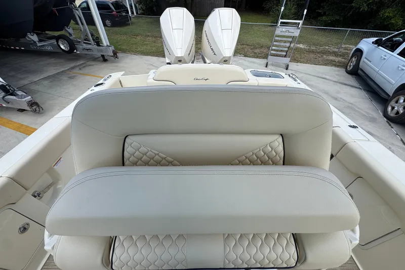 Slide: The Image of 2027 Chris-Craft Catalina 28 boat interior with luxurious seating and dual Mercury engines. - 31