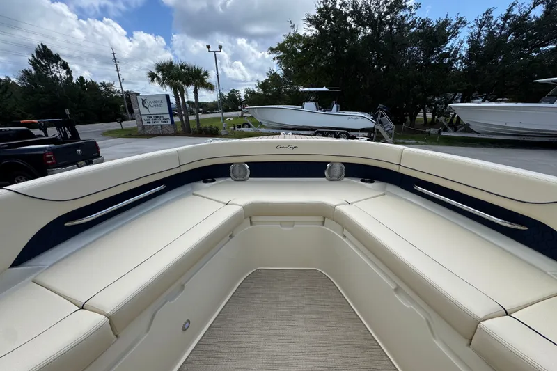 Slide: The Image of 2027 Chris-Craft Catalina 28 boat interior with beige seating and sleek design. - 21