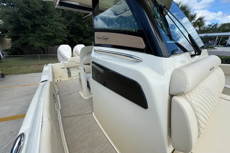 Slide: The Image of 2027 Chris-Craft Catalina 28 boat interior with luxurious seating and modern design. - 28