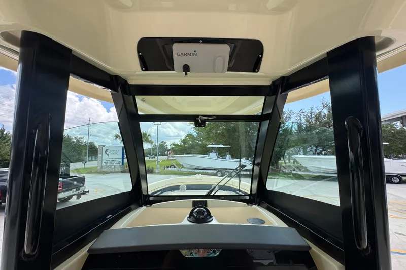 Slide: The Image of Interior view of 2027 Chris-Craft Catalina 28 boat with Garmin navigation system. - 36