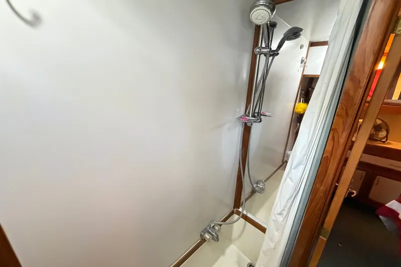 Slide: The Image of Shower area in 1989 Carver 3607 Aft Cabin Motor Yacht with modern fixtures. - 41