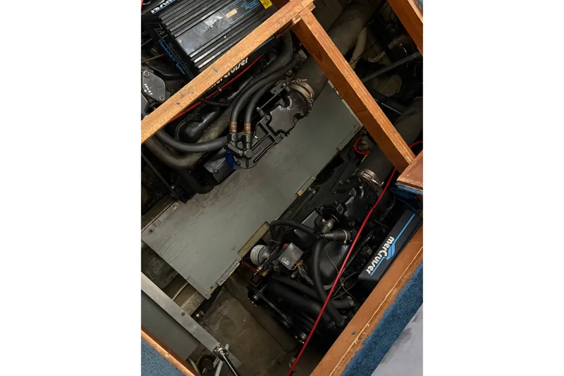 Slide: The Image of Engine compartment of 1989 Carver 3607 Aft Cabin Motor Yacht with MerCruiser components. - 52