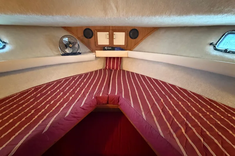 Slide: The Image of Interior cabin of 1989 Carver 3607 Aft Cabin Motor Yacht with striped bedding. - 29