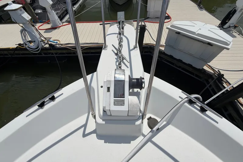Slide: The Image of 1989 Carver 3607 Aft Cabin Motor Yacht anchor system at marina dock. - 8