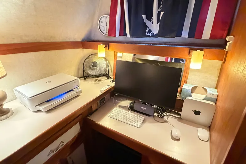 Slide: The Image of Compact office setup inside 1989 Carver 3607 Aft Cabin Motor Yacht with computer and printer. - 39