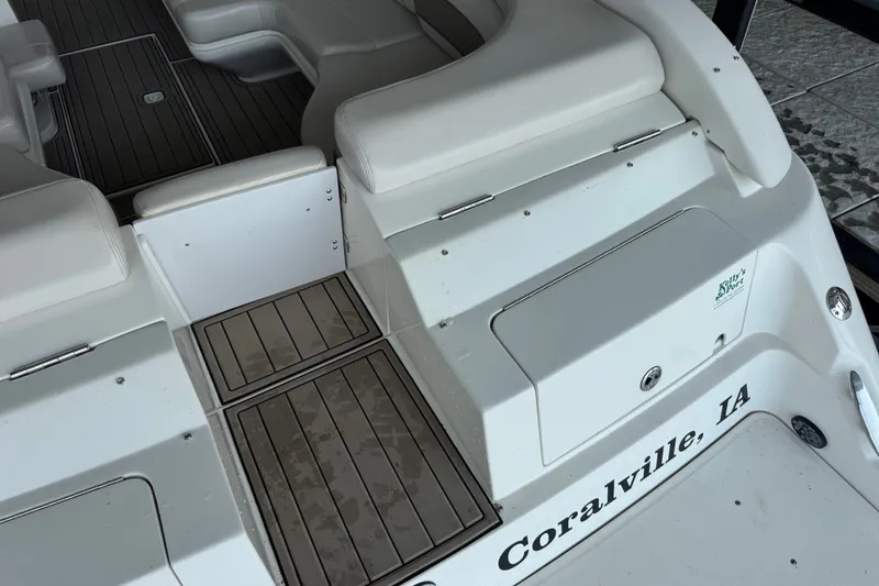 Slide: The Image of Interior of a 2002 Regal 2900 LSR boat with seating and deck details. - 43