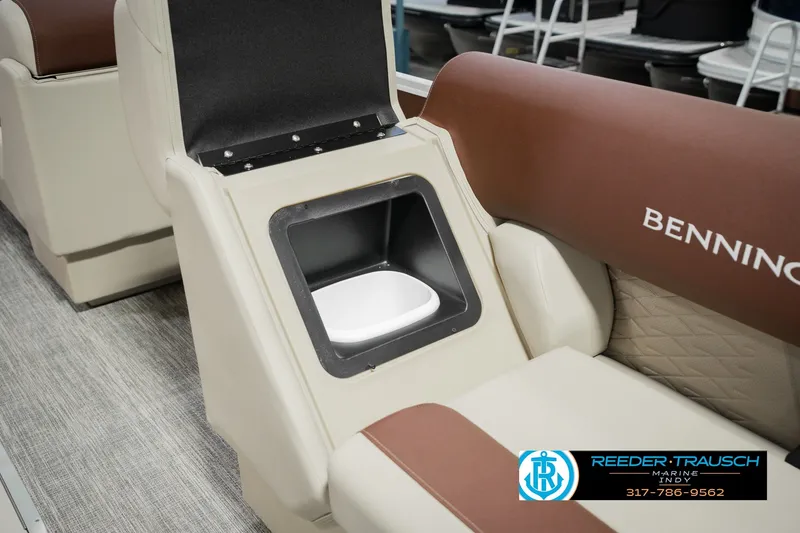 Slide: The Image of Bennington 22 SLJ 2027 boat interior with storage compartment and seating. - 29