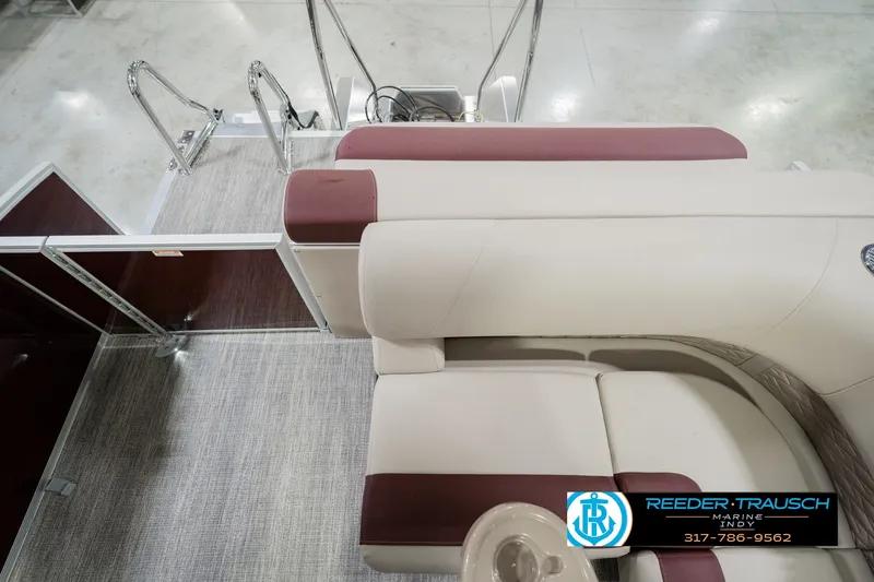 Slide: The Image of 2027 Bennington 22 SLJ boat interior with plush seating and sleek design. - 21