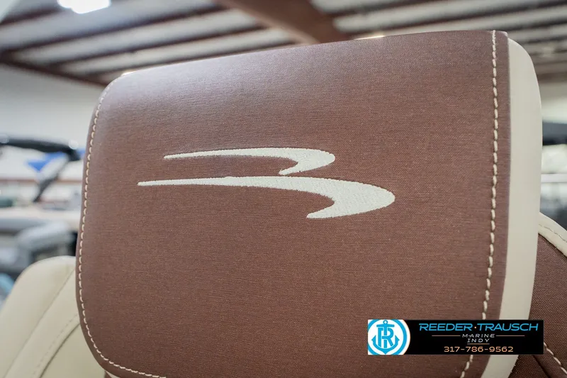 Slide: The Image of Close-up of 2027 Bennington 22 SLJ boat seat with logo and stitching detail. - 50