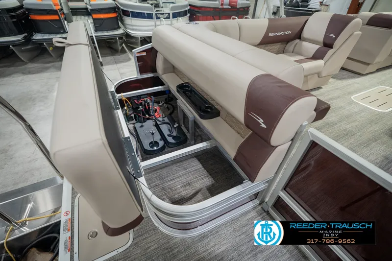 Slide: The Image of Bennington 22 SLJ 2027 pontoon boat interior with open storage compartment and seating. - 38