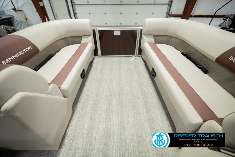 Slide: The Image of Interior of 2027 Bennington 22 SLJ pontoon boat with beige and brown seating. - 25